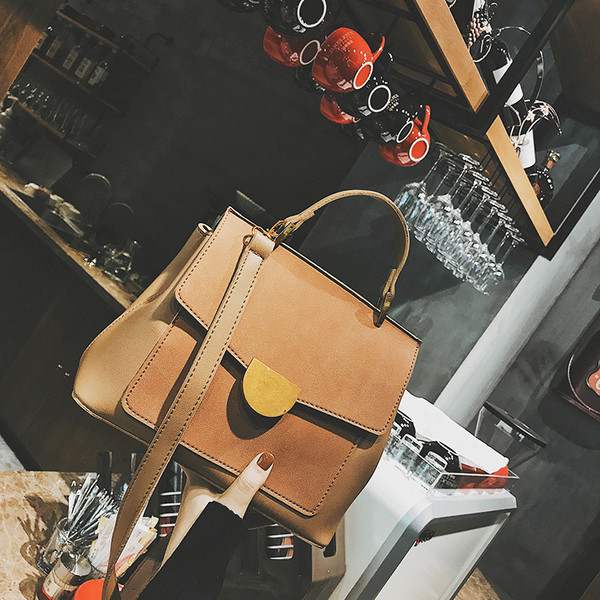 Geanta de dama cu inchidere metalica