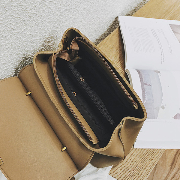 Geanta de dama cu inchidere metalica