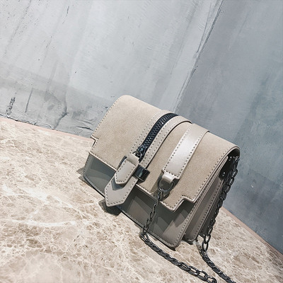 Geanta de dama cu element de fermoar in mai multe culori