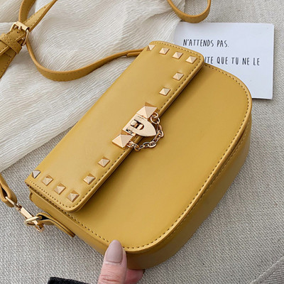 Geanta de dama moderna cu elemente metalice - in patru culori