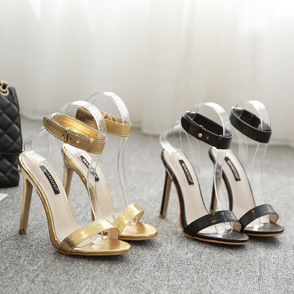 Sandale moderne de damă cu toc în negru și auriu
