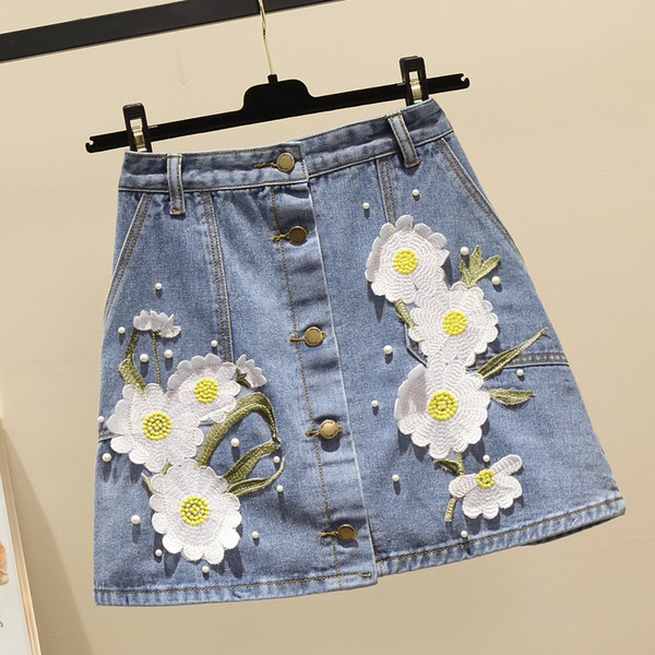 Fusta de dama din denim cu motive florale cu talie inalta