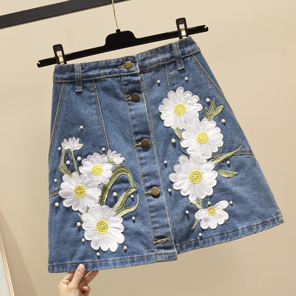 Fusta de dama din denim cu motive florale cu talie inalta