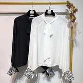 Cămașă elegantă de damă cu paiete pe mâneci în alb și negru