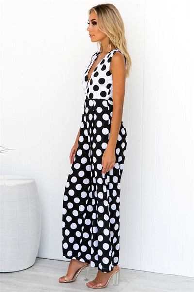 Salopetă lungă de damă cu buline în alb-negru