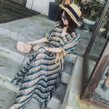 Model actual de rochie de dama cu maneci late