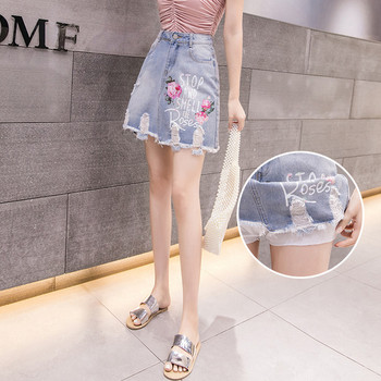 Fusta de dama moderna din denim cu motive rupte si imprimeu de culoare deschisa