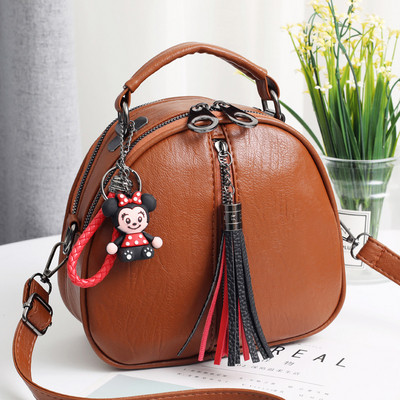 Geanta de mana din piele cu accesoriu in mai multe culori