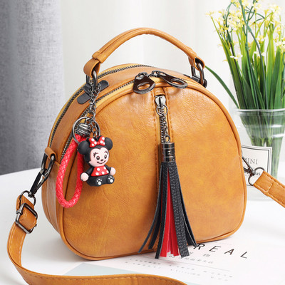 Geanta de mana din piele cu accesoriu in mai multe culori