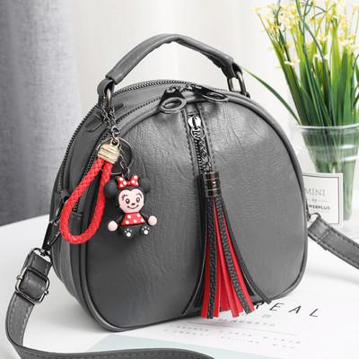 Geanta de mana din piele cu accesoriu in mai multe culori