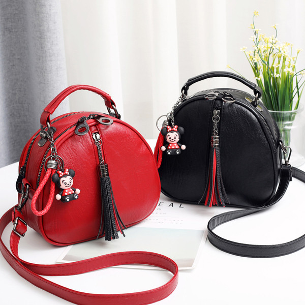 Geanta de mana din piele cu accesoriu in mai multe culori