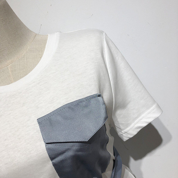 Bluză de damă cu legături în talie și buzunar alb