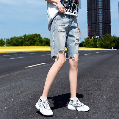 Pantaloni moderni de dama cu motive rupte lungime 3/4