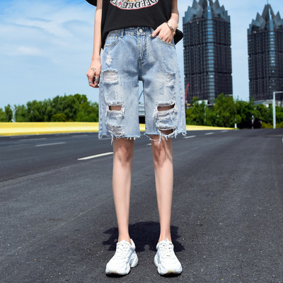 Pantaloni moderni de dama cu motive rupte lungime 3/4