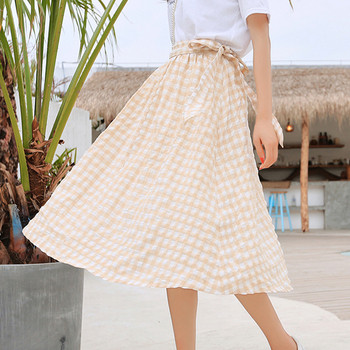 Актуална дамска разкроена карирана пола в два цвята с висока талия