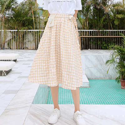 Актуална дамска разкроена карирана пола в два цвята с висока талия