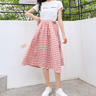 Актуална дамска разкроена карирана пола в два цвята с висока талия