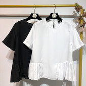 Bluză de damă cu mâneci scurte și pliuri în alb și negru