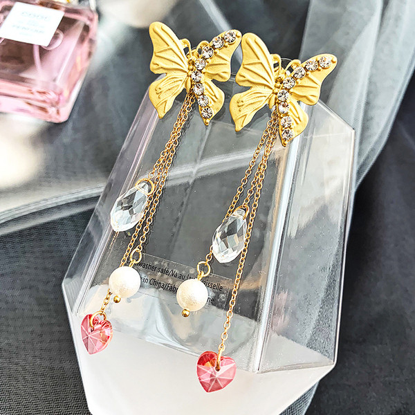 Cercei de dama actuali de culoare aurie cu margele si pietre