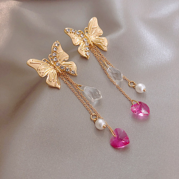 Cercei de dama actuali de culoare aurie cu margele si pietre