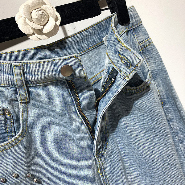 Blugi de dama de culoare albastra cu motiv rupt si perle