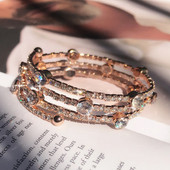 Brățară elegantă de damă în culoarea aurie-cu pietre