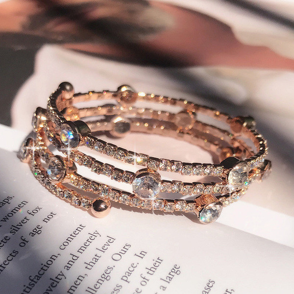 Brățară elegantă de damă în culoarea aurie-cu pietre