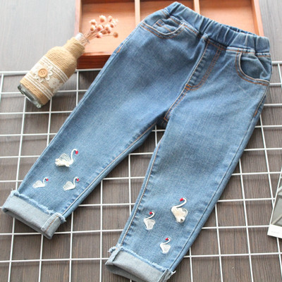 Blugi moderni pentru copii cu motive rupte in albastru pentru fete