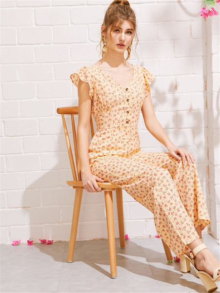 Salopetă lungă de damă cu model floral și nasturi