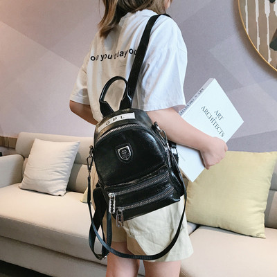 Rucsac modern de dama cu fermoar si element metalic in mai multe culori