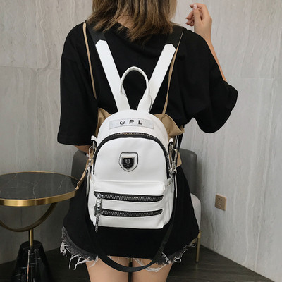 Rucsac modern de dama cu fermoar si element metalic in mai multe culori