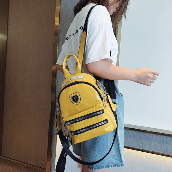 Rucsac modern de dama cu fermoar si element metalic in mai multe culori