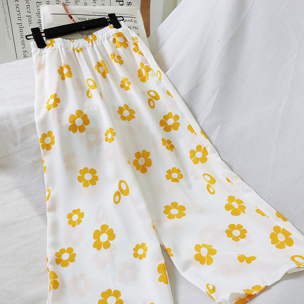 Pantaloni de dama la moda cu motive florale in mai multe culori