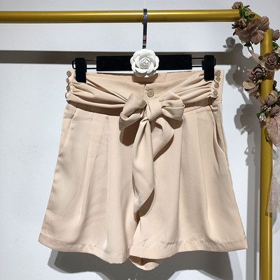 Pantaloni scurți de damă cu legături în talie în două culori