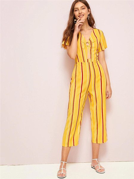 Κομψή γυναικεία ολόσωμη φόρμα με κοντό μανίκι σε κίτρινο χρώμα