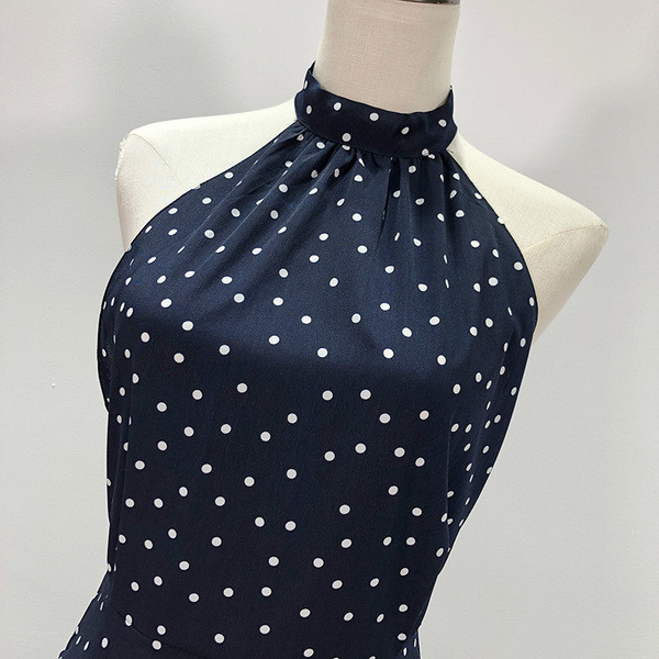 Γυναικεία ολόσωμη φόρμα σιφόν  πουά σε μπλε χρώμα εξώπλατο