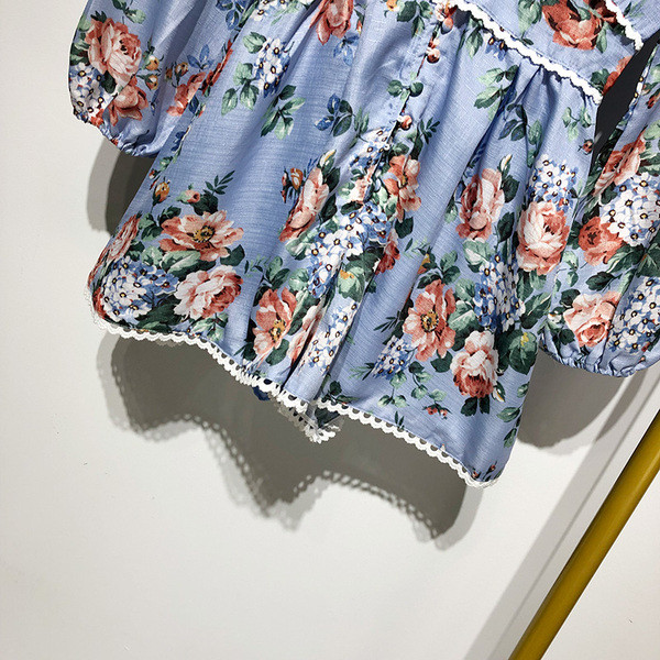 Σύντομη γυναικεία ολόσωμη φόρμα με V neckline και μακρύ μανίκι