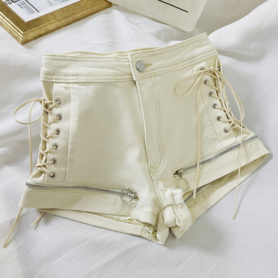 Pantaloni scurți de damă cu fermoare și cravate în alb-negru