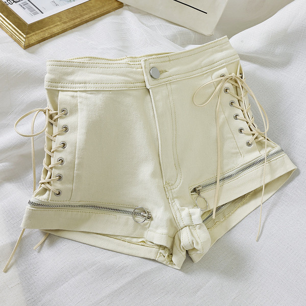 Pantaloni scurți de damă cu fermoare și cravate în alb-negru