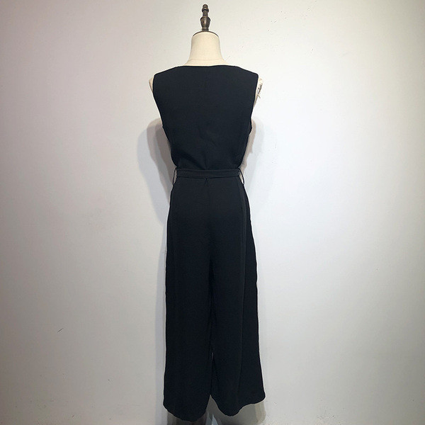 Salopetă lungă de damă cu bretele largi și legături în talie