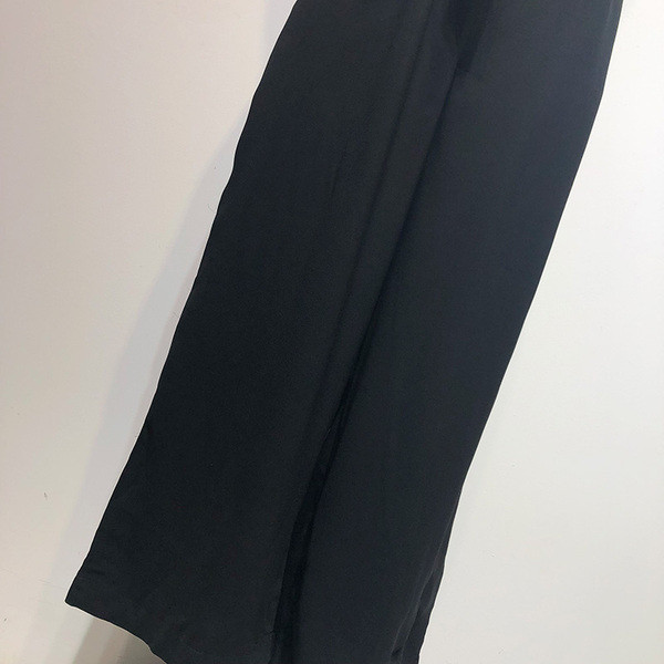 Salopetă lungă de damă cu bretele largi și legături în talie