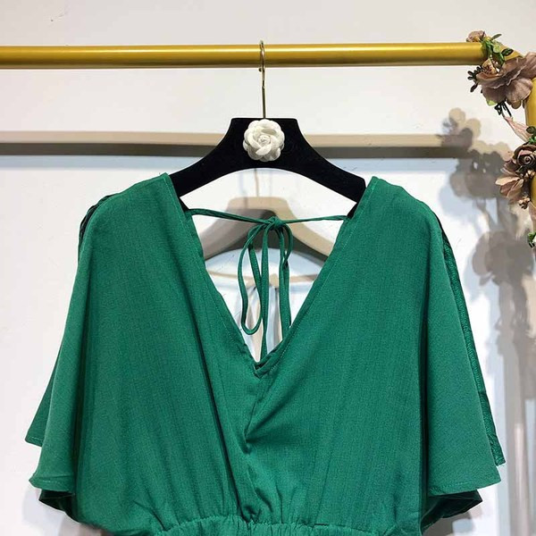 Γυναικε`ια ολόσωμη φόρμα σε  πράσινο χρώμα