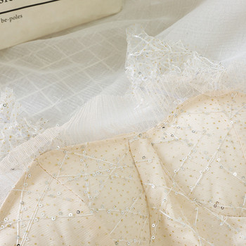 Model elegant de rochie de dama cu efect stralucitor in negru si bej