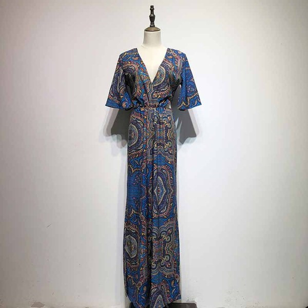 Salopetă lungă cu decolteu în V adânc