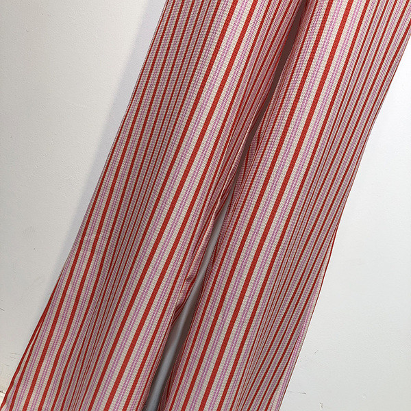 Salopetă de damă în dungi cu legături în talie