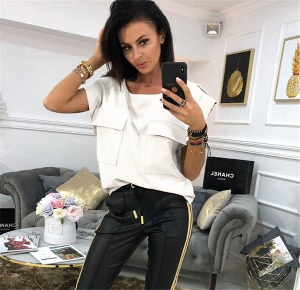 Bluză de damă elegantă cu buzunare în alb