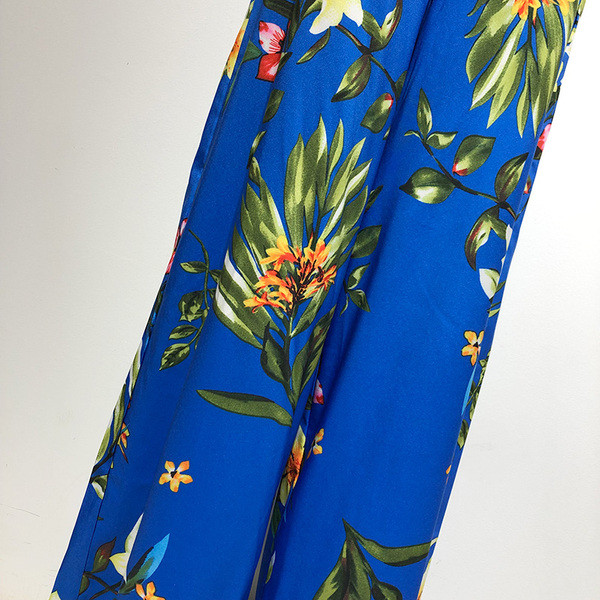 Γυναικεία ολόσωμη φόρμα  με βαθύ λαιμό V και κορδόνια στη  μέση