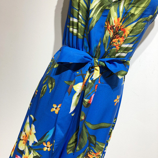 Γυναικεία ολόσωμη φόρμα  με βαθύ λαιμό V και κορδόνια στη  μέση