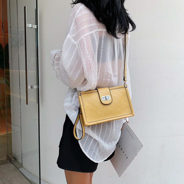 Geanta de dama moderna cu inchidere metalica in mai multe culori