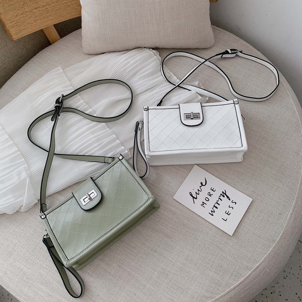 Geanta de dama moderna cu inchidere metalica in mai multe culori